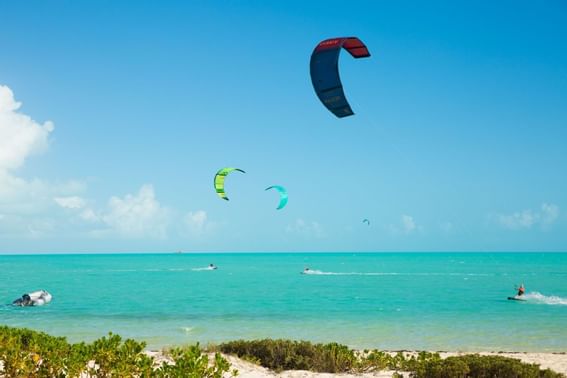 View of tourists kite boarding near H2O Life Style Resort