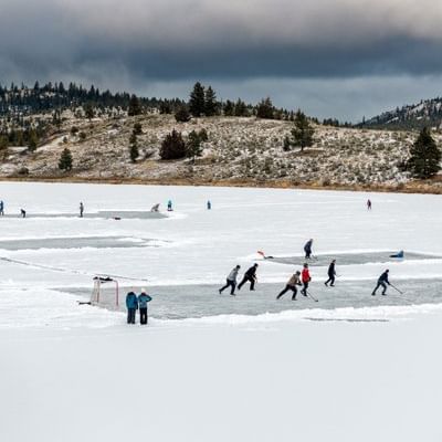 Ice skating on a frozen lake