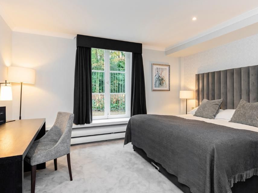deluxe double room in the courtyard at gorse hill in surrey