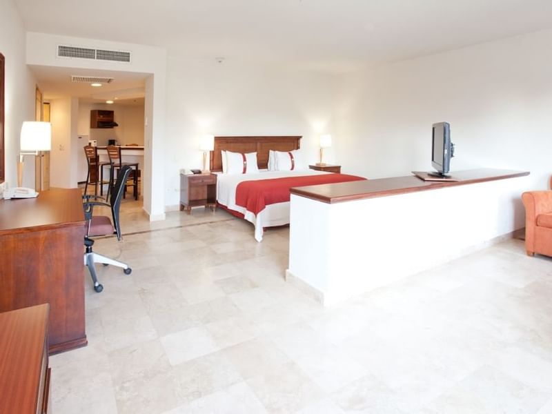 Bed & furniture in Master Suite at Gamma Hotels