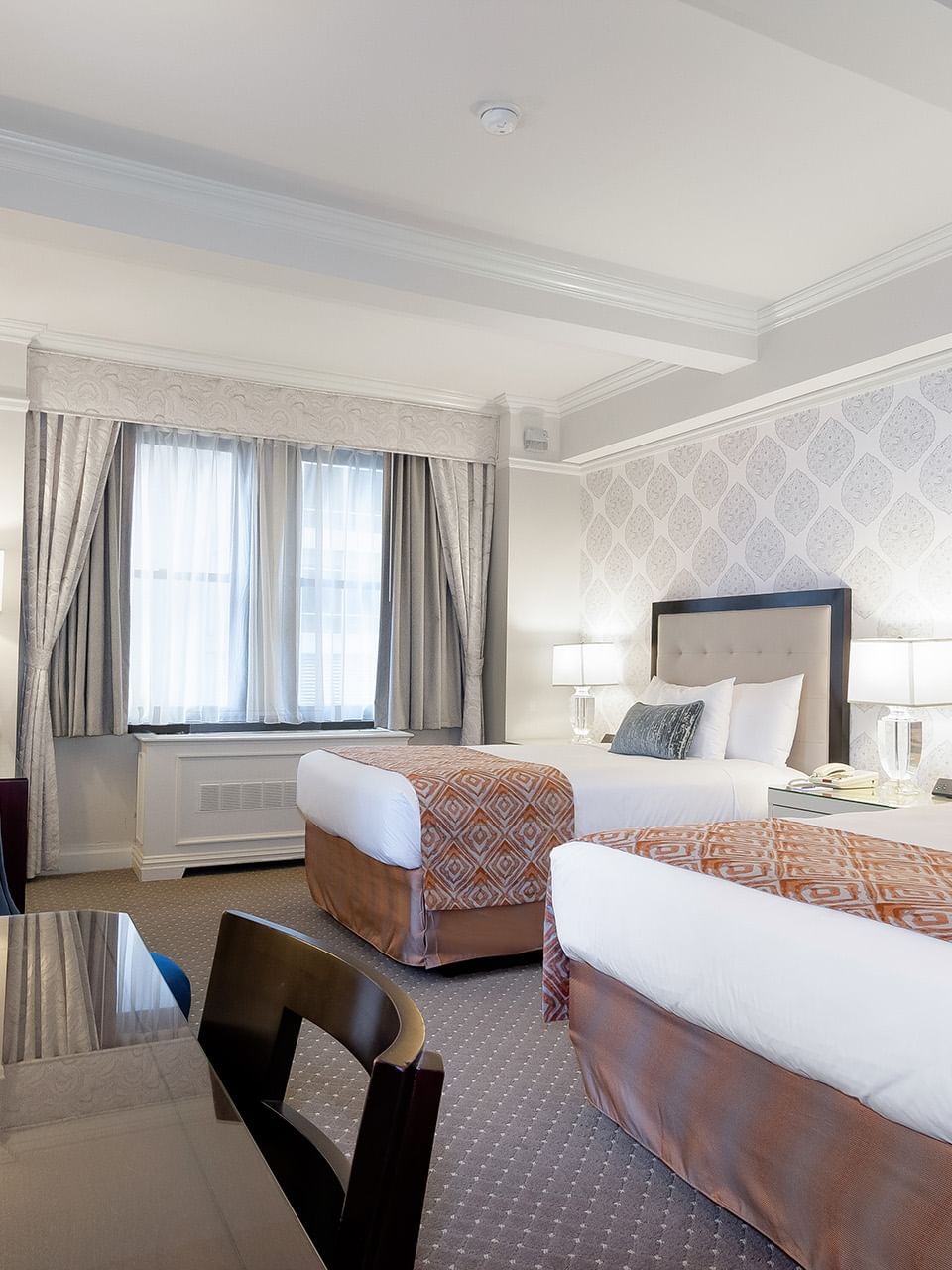 TV facing bed near window in Premier City View 2 Double Beds with Terrace at Warwick New York