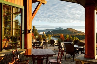 Outdoor dining patio at Lake Placid Club Grandview offering spectacular views of the lake and mountains