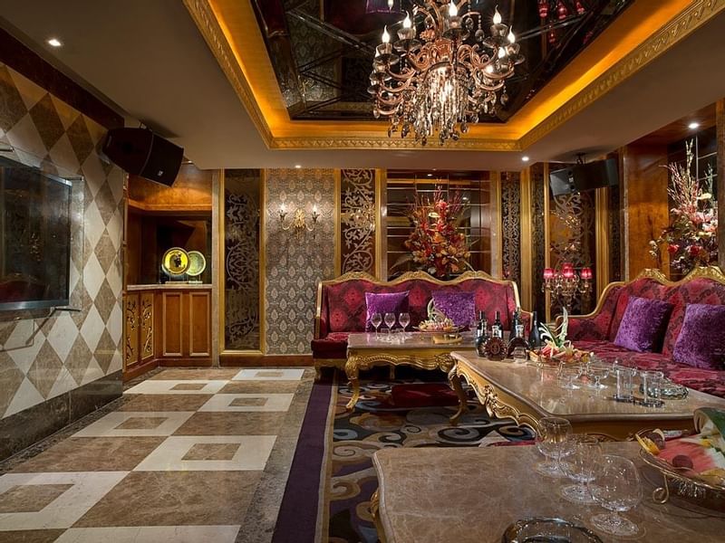 Spacious lobby lounge area with cozy couches in KTV Night Club at Celebrity International Grand Hotel