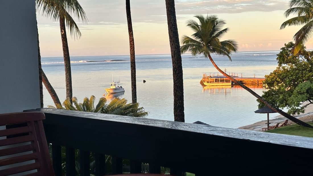 Balcony with ocean view and tropical setting at Warwick Fiji in Korolevu.