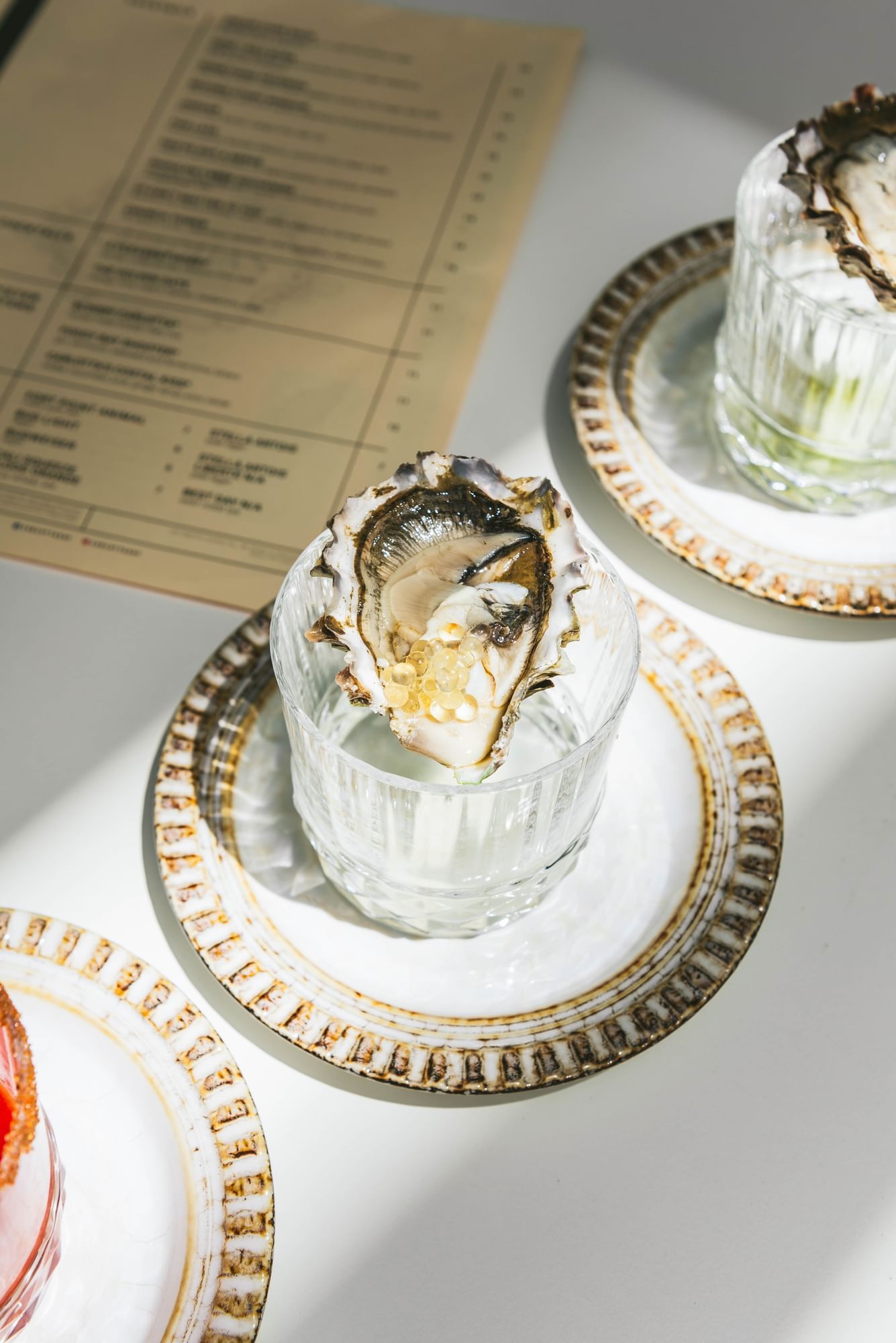 a table with oysters on the half shell