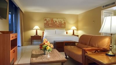 hotel suite with flowers on table