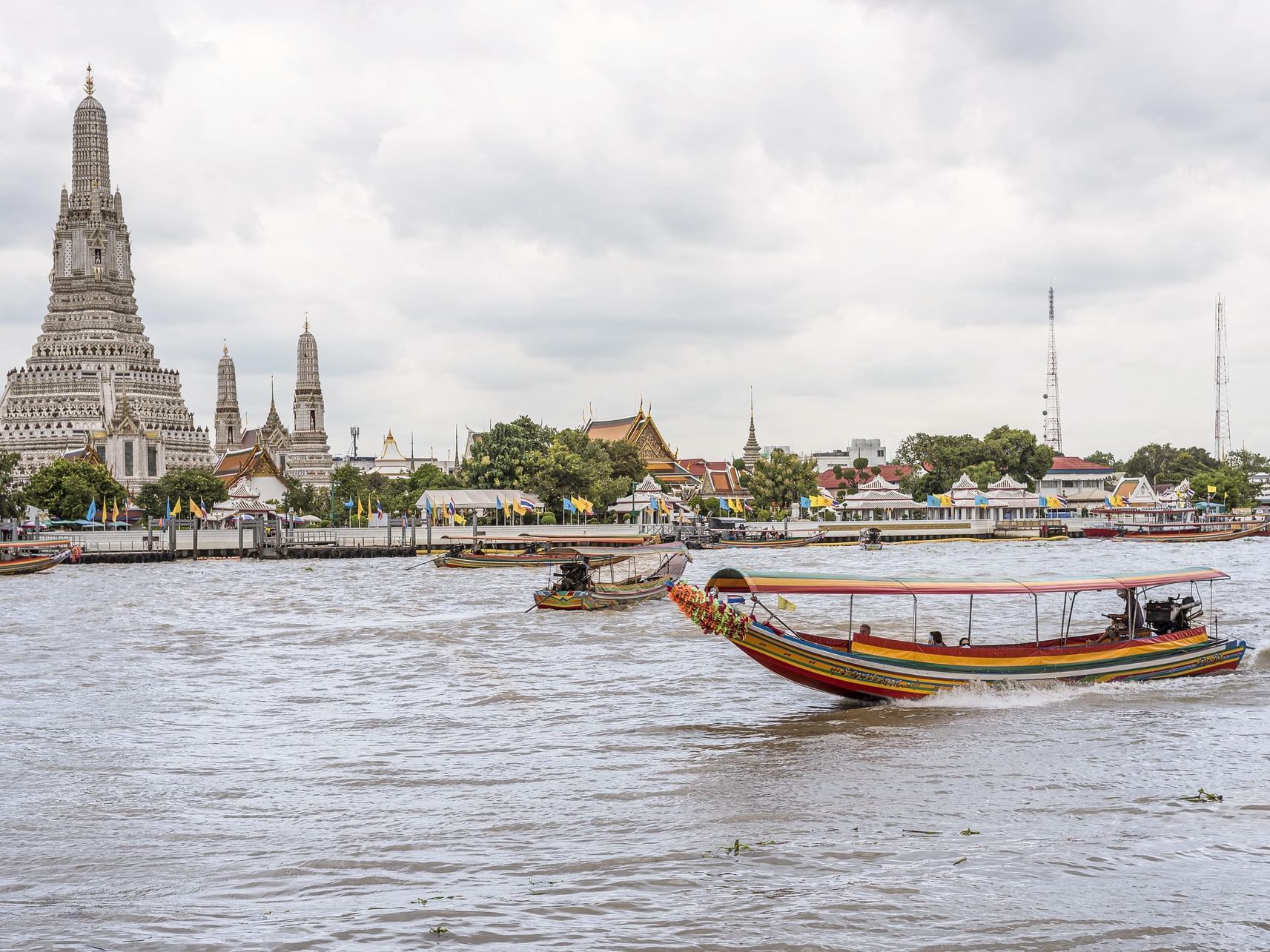 Boats on Chao Phraya River near Chatrium Residence Sathon