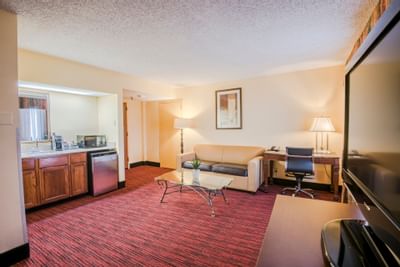 Living area of Dallas Parlor Suite 1 at MCM Elegante Suites