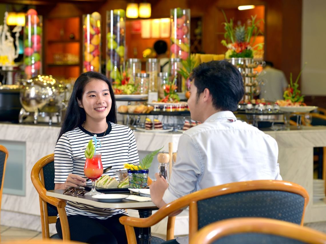 Couple Dining in Buffet Restaurant