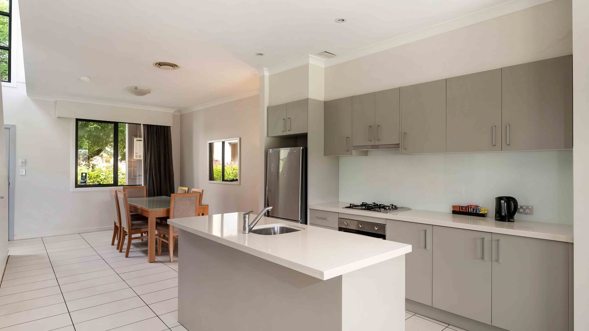 kitchen and dining room in a large two bedroom apartment
