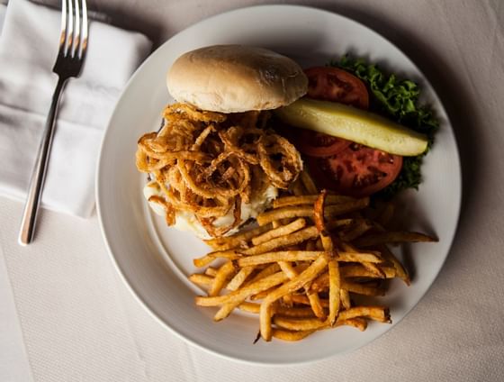 A plate of a burger and fries served at Stein Eriksen Lodge