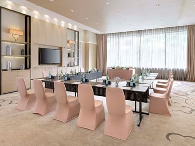 U shaped table setup in a room at Okura Prestige Bangkok