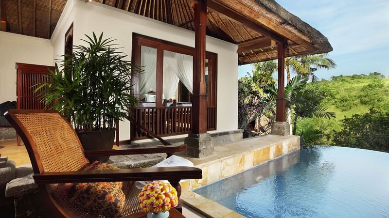 View of a sitting area beside a pool at Warwick Ibah Villas