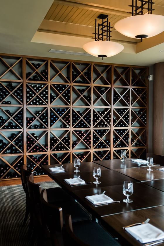Wine in a shelf at a restaurant at Alderbrook Resort & Spa