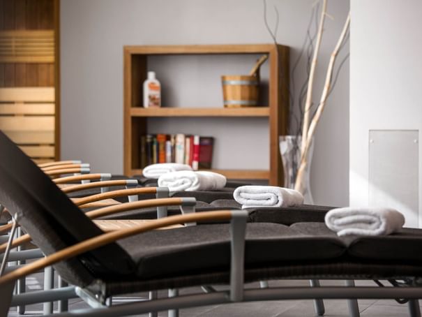 Close-up of relaxing chairs with towels at Hotel Berlin Berlin