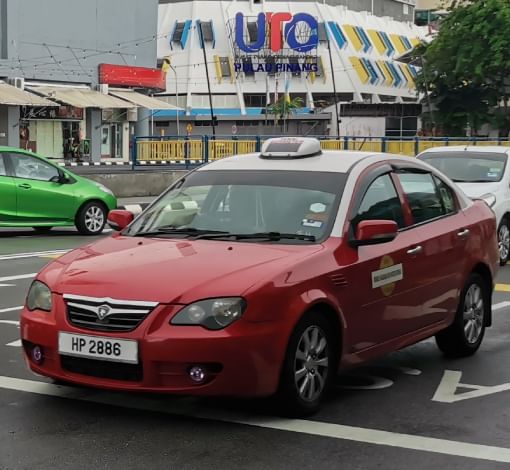 Taxi car parked in a parking lot in Penang near Sunway Hotel Seberang Jaya