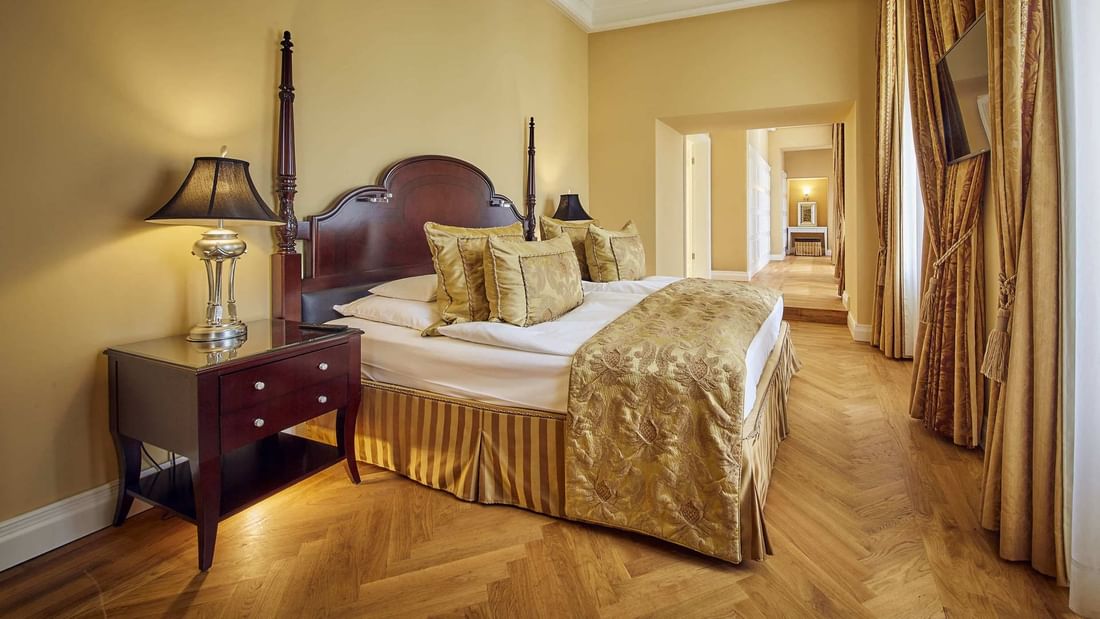 Large Bed & wooden floors, Schloss Suite, Falkensteiner Hotels