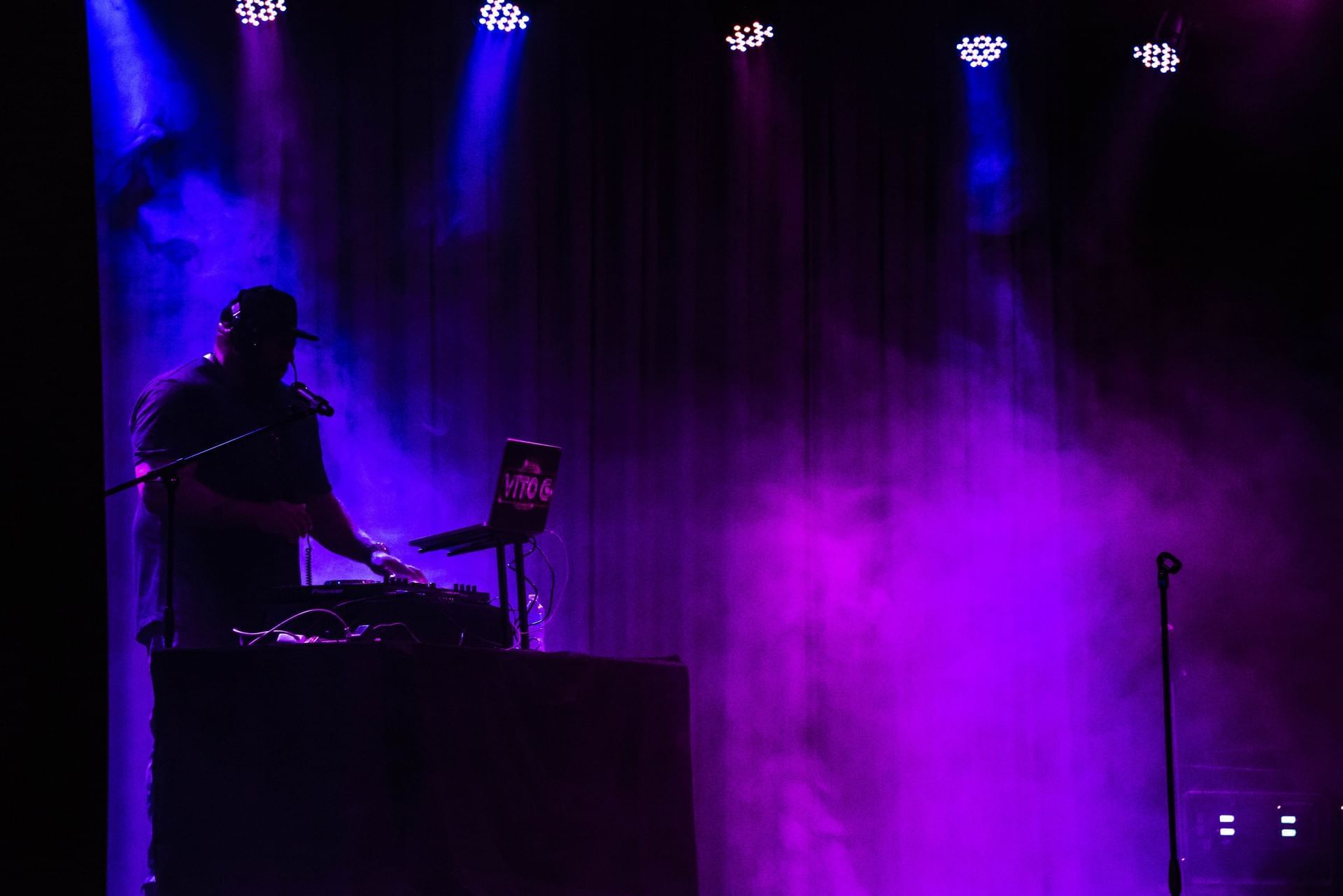 Boy singing in night party at Cove Haven Resort