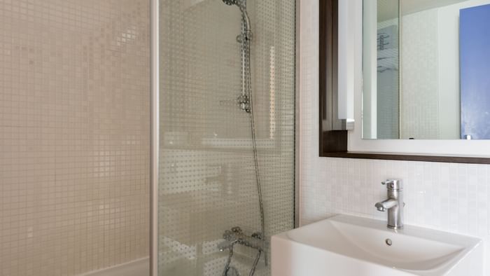 Bathroom vanity in bedrooms at Hotel Le Gayant