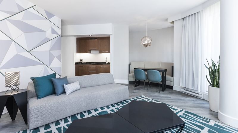 Crystal Suite with living space with sofa and coffee table at Warwick Le Crystal