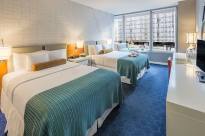 Two beds in Deluxe Double Queen Room at Kinzie Hotel