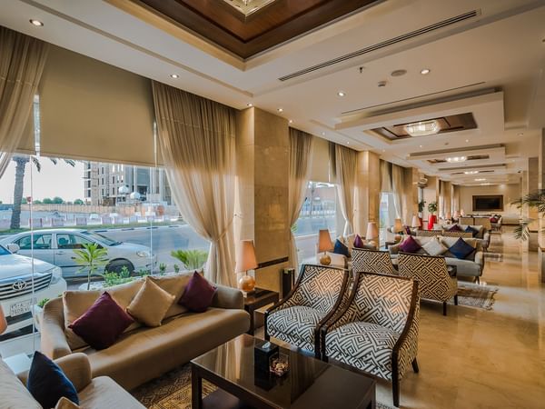 Lobby overlooking the parking area at Warwick Hotels and Resorts