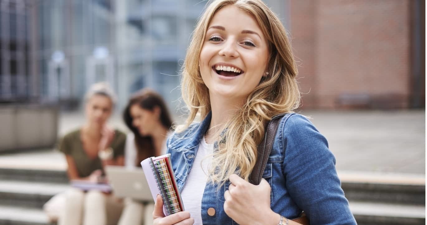 Happy student at UniLodge accommodation