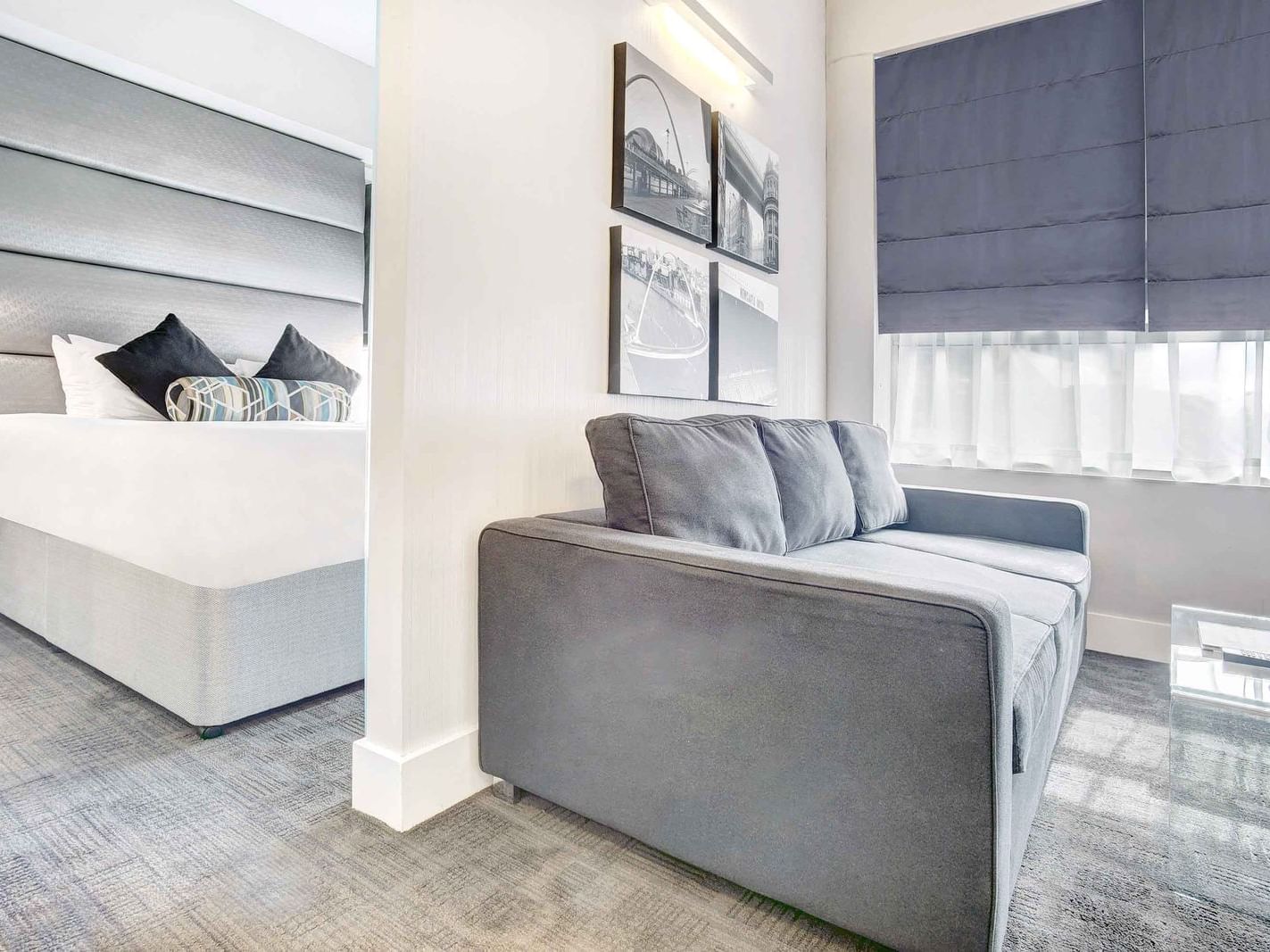 The Executive King Suite at Sandman Signature Newcastle Hotel with one super king bed (with premium pillow-top) and one pull-out sofa bed
