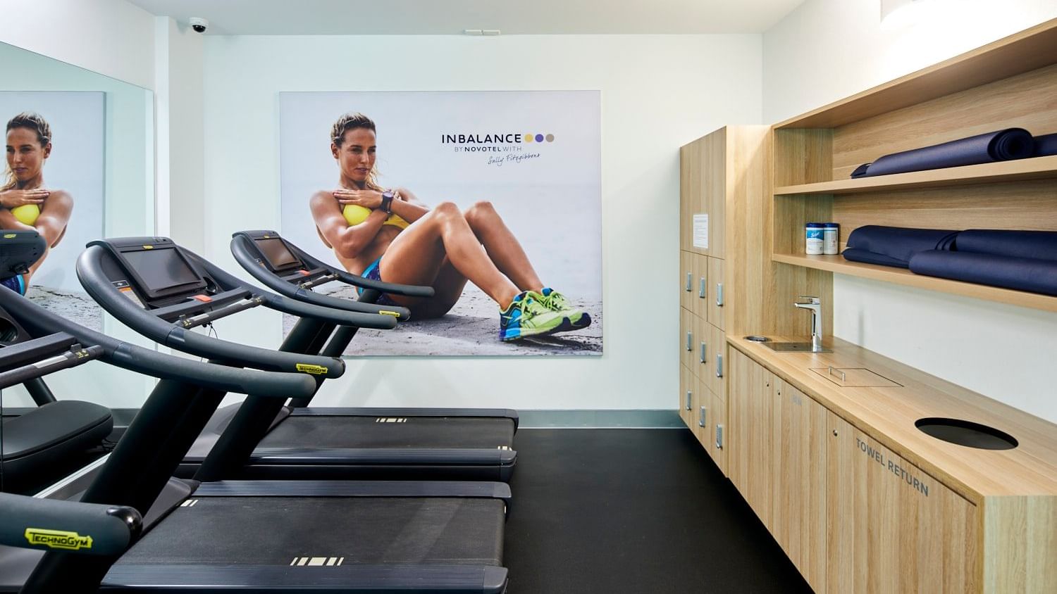 Interior of fully equipped gym at Novotel Melbourne on Collins