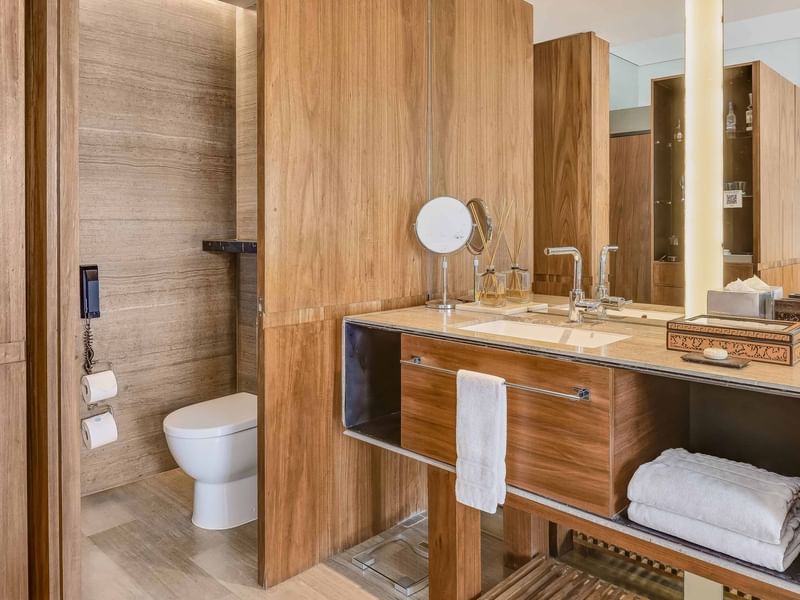 Vanity & toilet in Deluxe Room at FA Hotels & Resorts