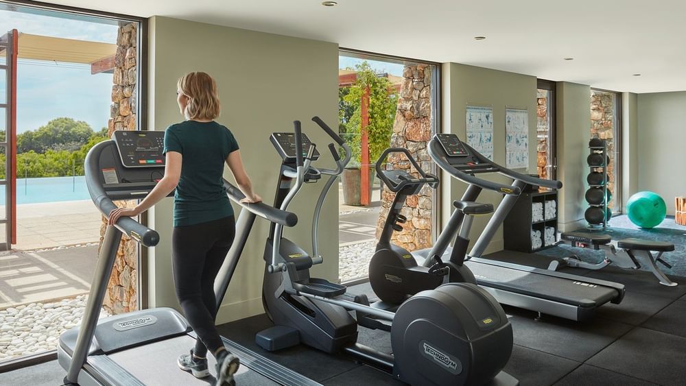 Fully-equipped gymnasium including treadmills, cross trainers, exercise bikes, leg press machine, free weights/weights bench 