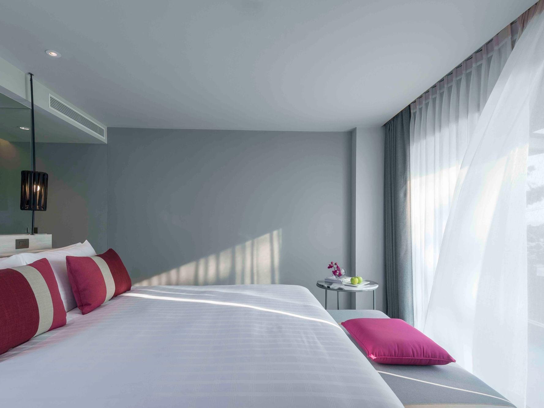 Deluxe beachfront room with king size bed at U Hotels