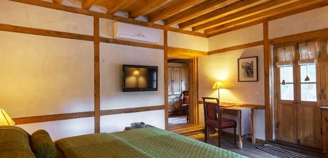 Interior of the Heritage Suite bedroom at Serena Khaplu Palace