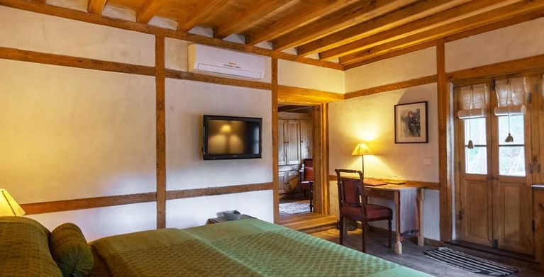 Interior of the Heritage Suite bedroom at Serena Khaplu Palace