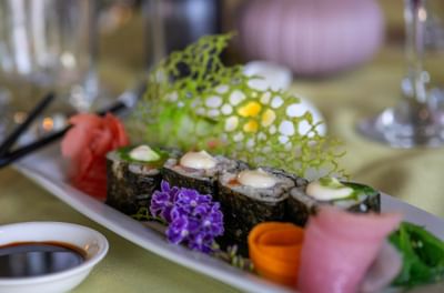 Sushi rolls with sauce on a plate from Warwick Le Lagon - Vanuatu Port Vila