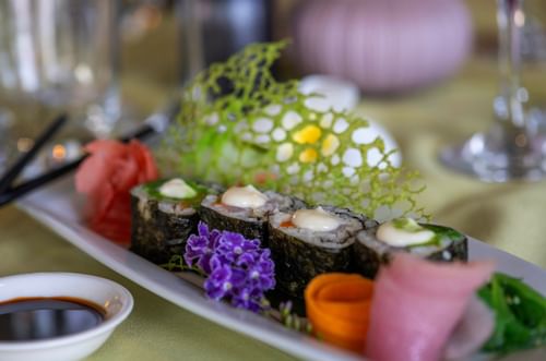 Sushi rolls with sauce on a plate from Warwick Le Lagon - Vanuatu Port Vila