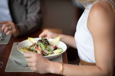woman about to enjoy a lovely salad