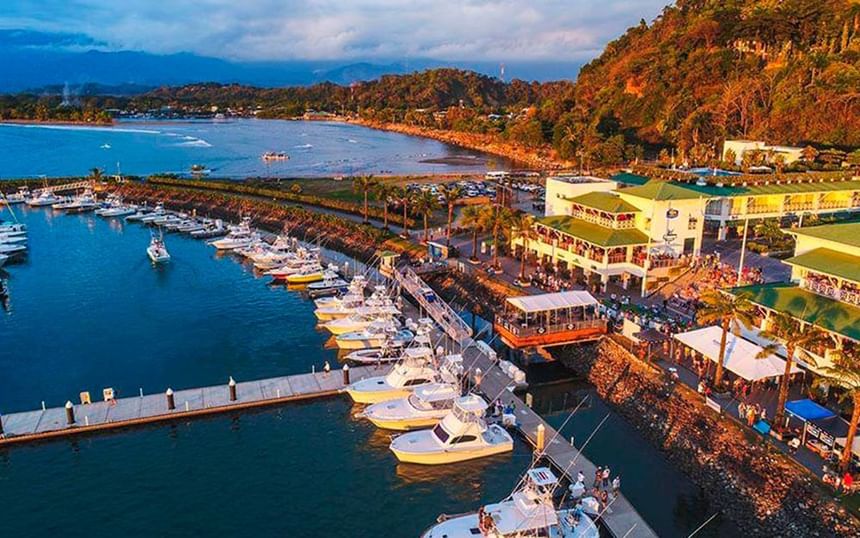 Aerial view of the city & docked boats near Jungle Vista Boutique Hotel