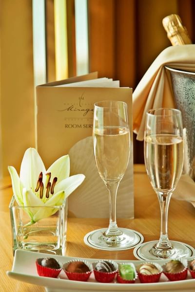 Two glasses of beverage with sweets at Hotel Cascais Miragem