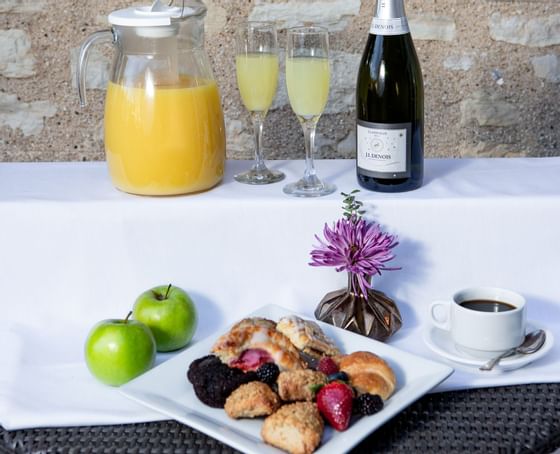 mimosas, fruit, and pastries