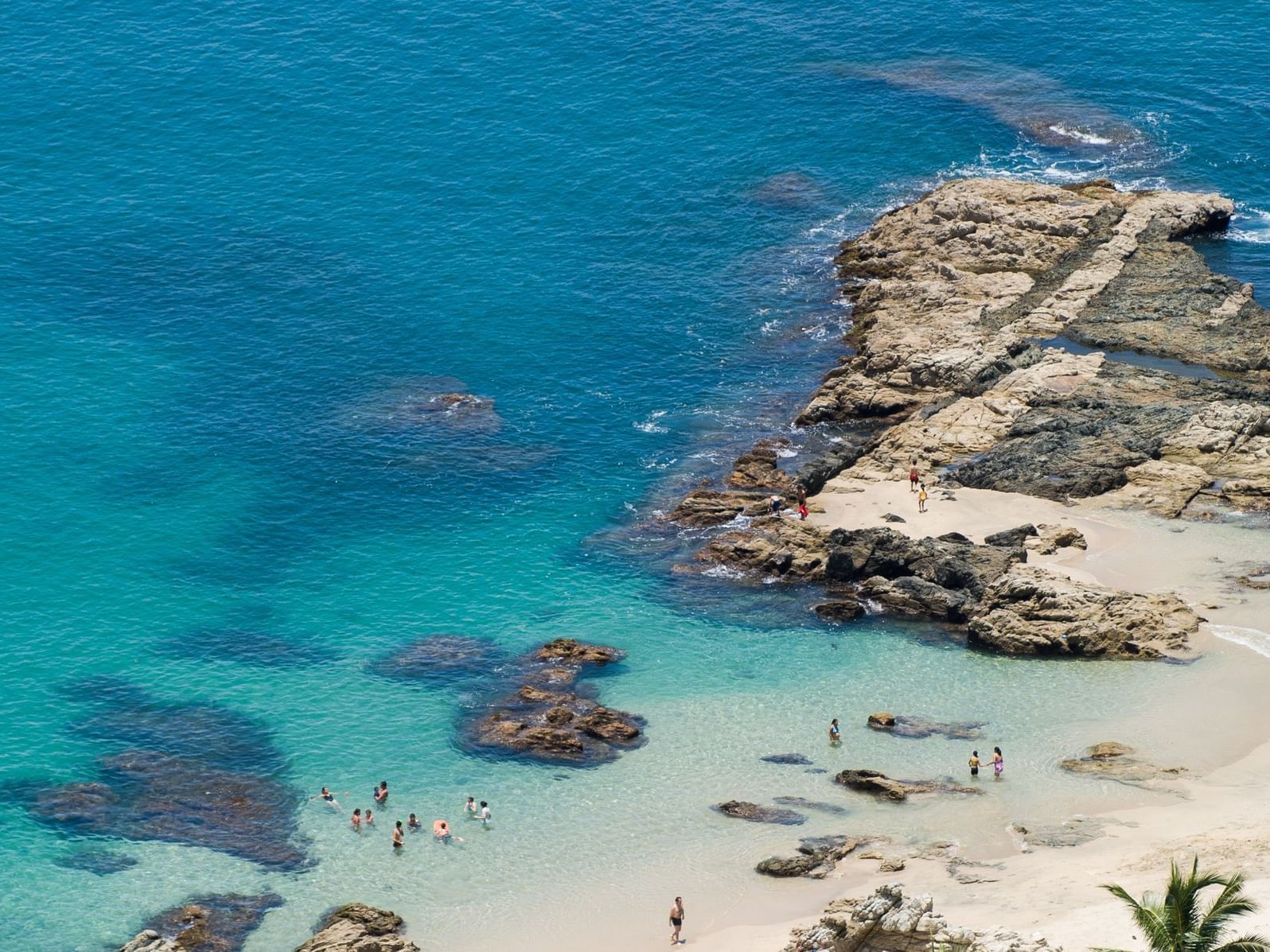 Conchas Chinas Beach with clear blue-green water near Buenaventura Grand Hotel and Spa