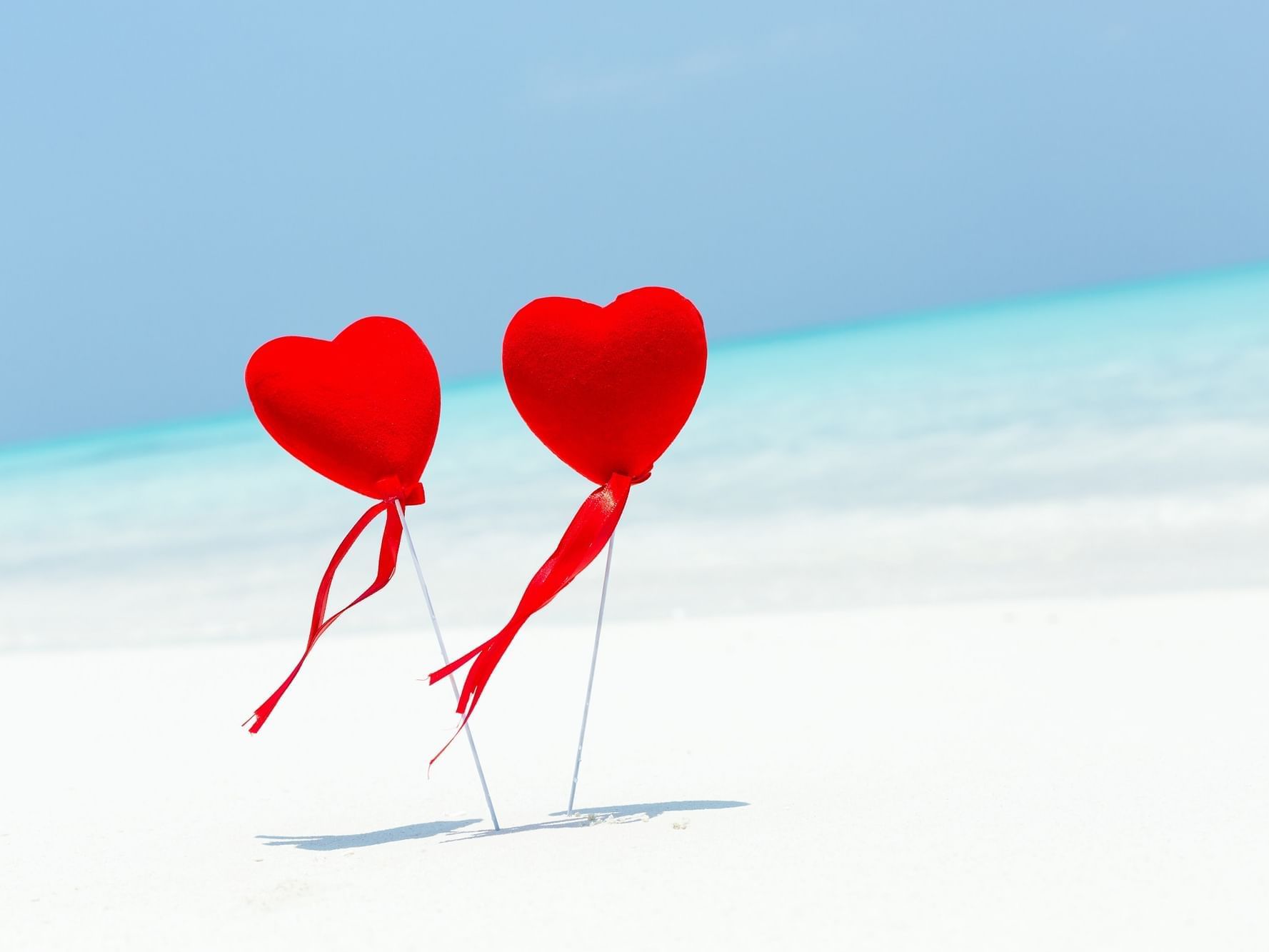 Closeup of heart balloons in beach at Daydream Island Resort