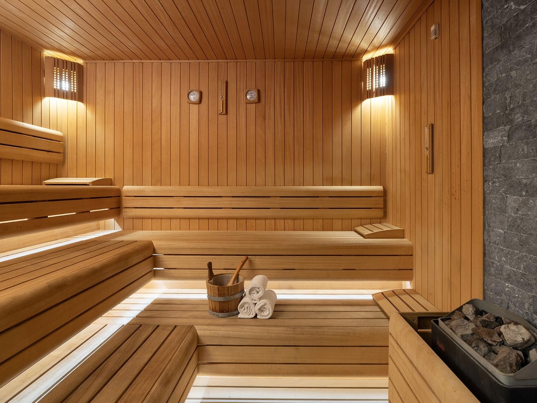 Wooden sauna room with benches in the spa of Titanic City Taksim.
