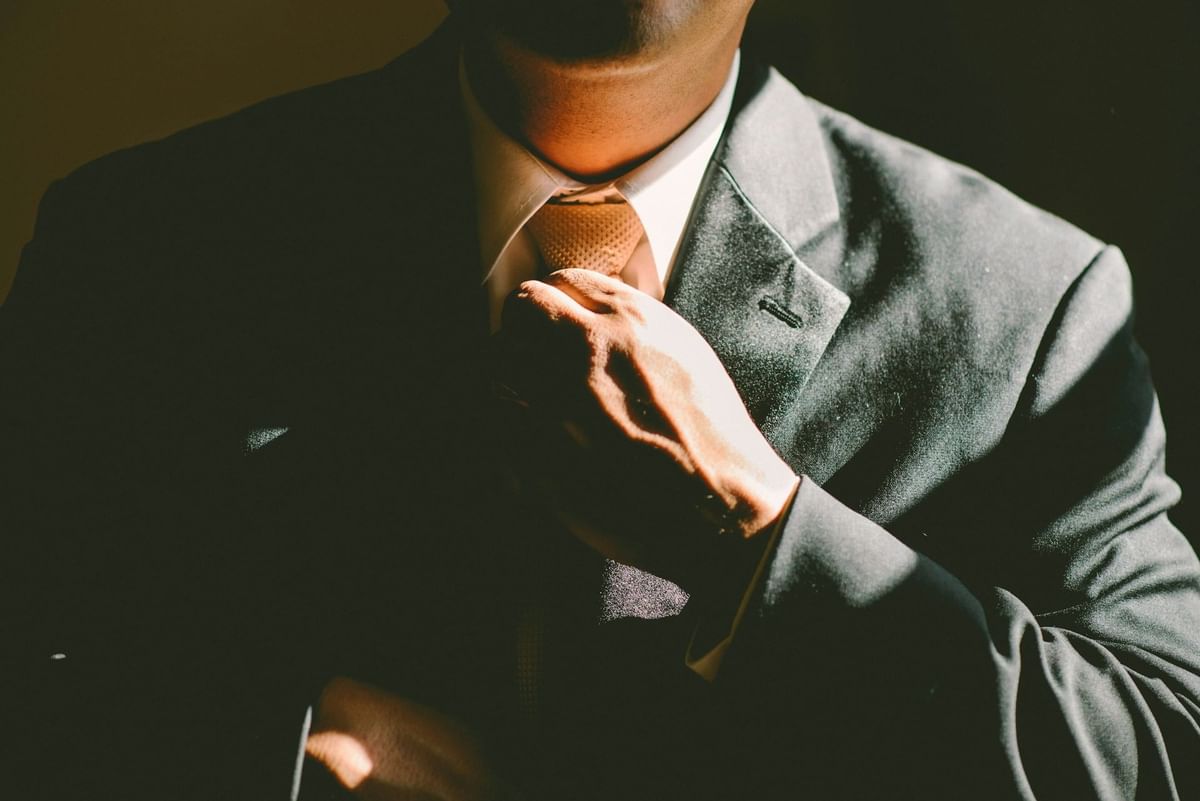 a person with suit