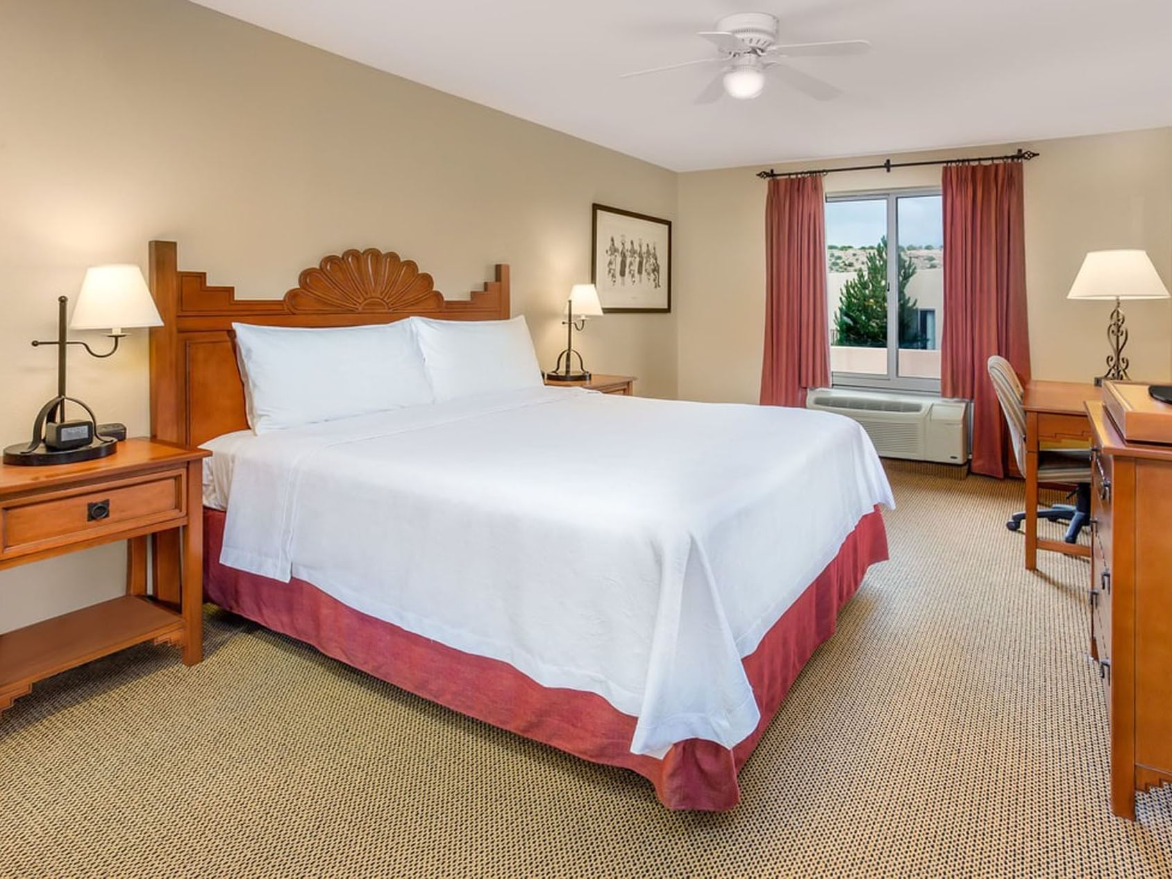 One King Bed Studio Casita Suite room with large bed at the Hilton Santa Fe Buffalo Thunder hotel.