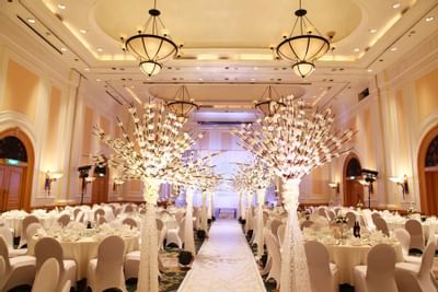Reception with white table cloths & flowers at Hanoi Daewoo Hotel