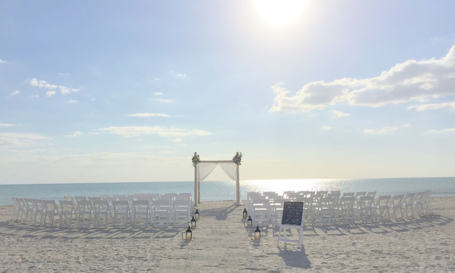 Outdoor wedding set-up on the seashore near Bilmar Beach Resort