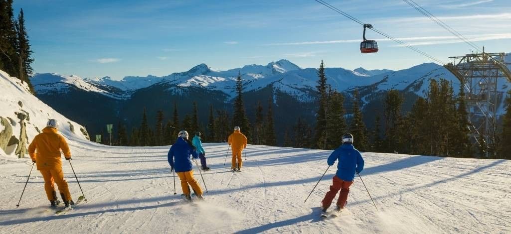 Group skiing with gondola in Whistler