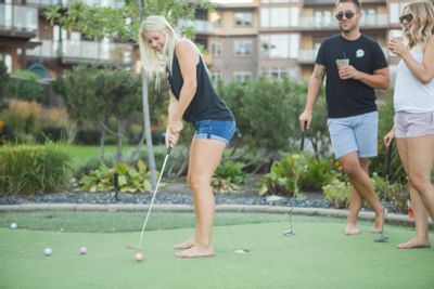 Guests on putting green
