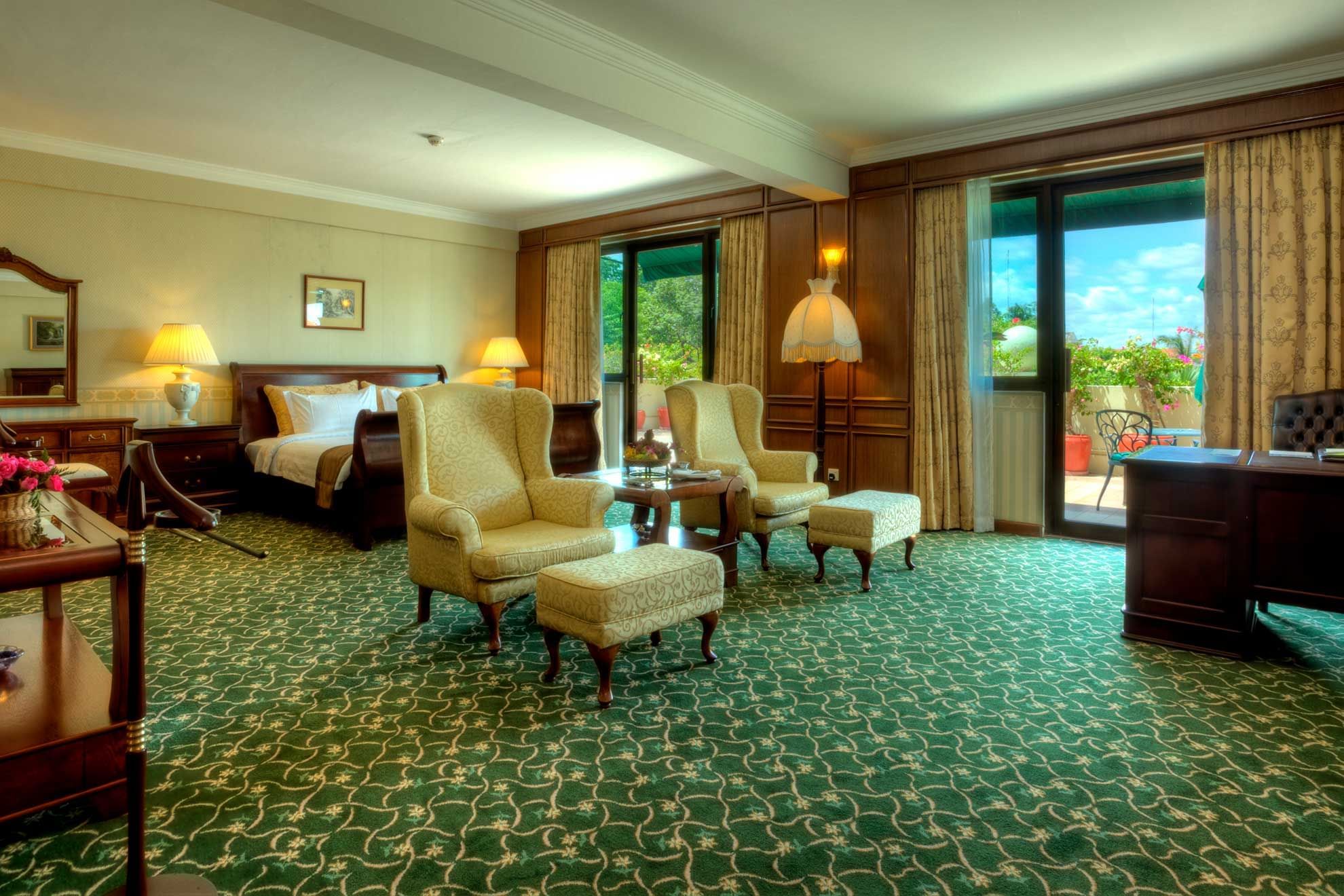 TV & lounge in Presidential Suite Bed Room at Sunway Hotel Phnom Penh